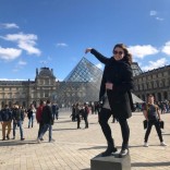 Trying to pinch the Louvre glass pyramid!